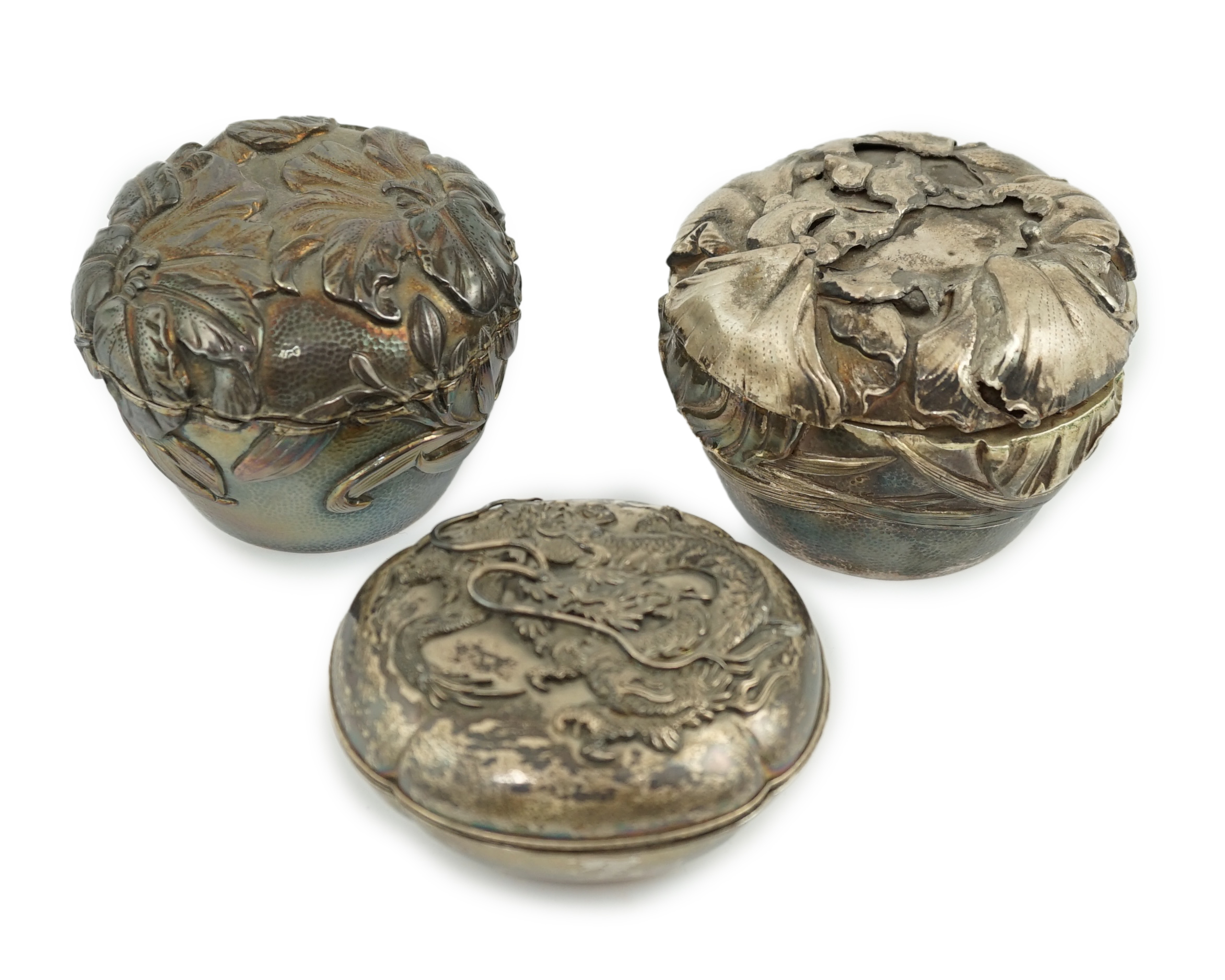 Three assorted early 20th century Japanese silver boxes with covers